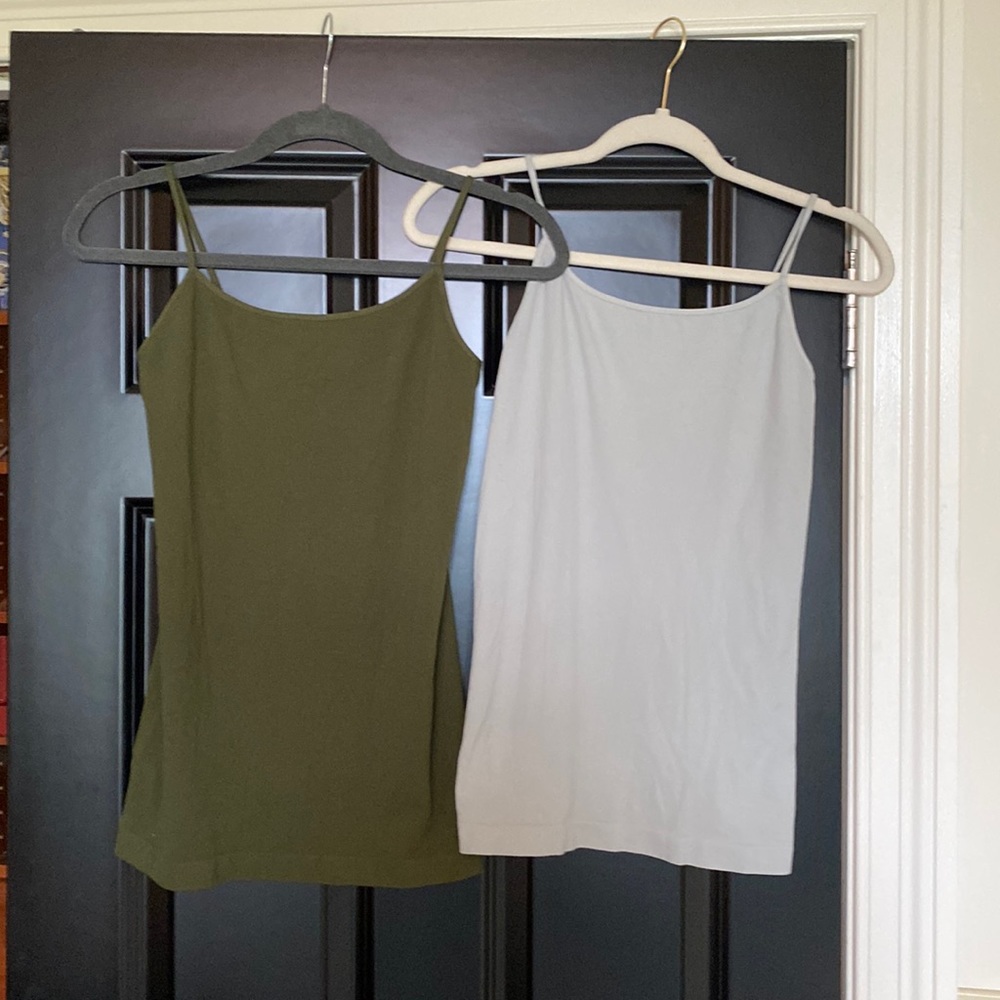 2 nikibiki NWOT tank tops. One pale gray and olive green. Super soft.